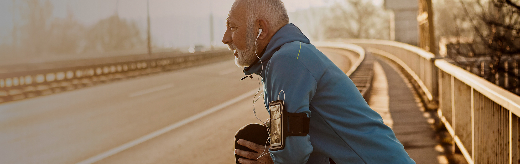 Man stretching during run